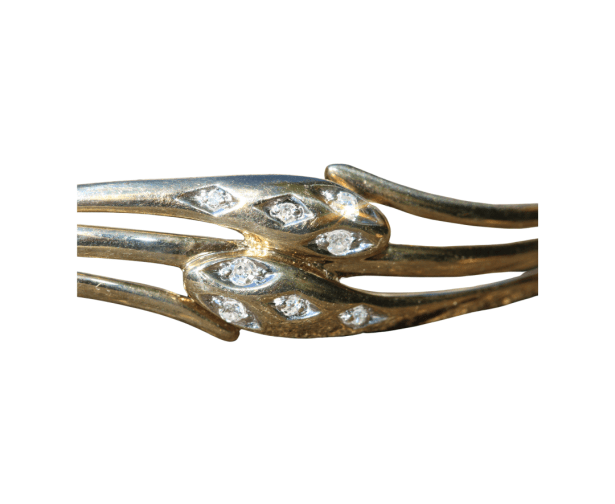 Gold snake headed bangle