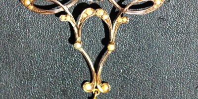 Australian 9ct Art Nouveau necklet set with aquamarines and seed pearls,